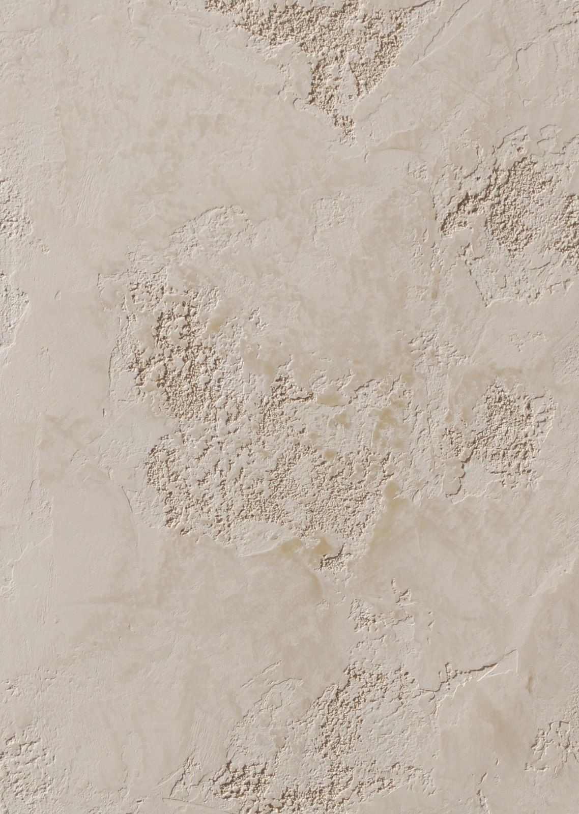Close-up detail of acrylic plaster wall showing authentic handcrafted texture and natural variations